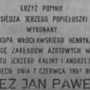 Tablica na Krzyżu Pomniku ks. Popiełuszki we Włocławku